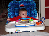 Maddie testing out our new high chair.